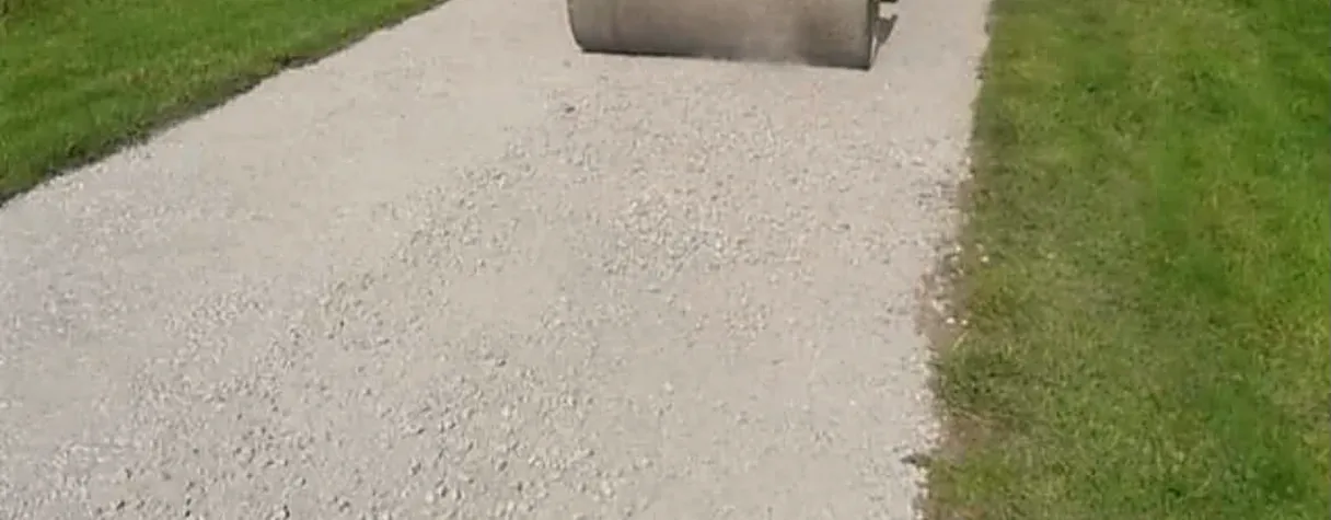 Tar and gravel driveway being rolled in Garryhill, Co. Carlow